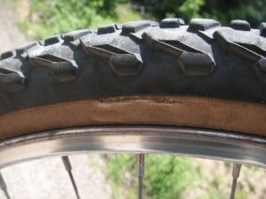 deflate bike tire